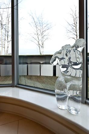 glass statue in window of central London penthouse apartment