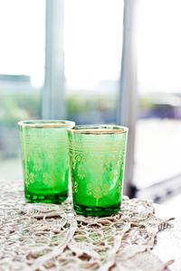 Two green glasses in Central London short stay apartment