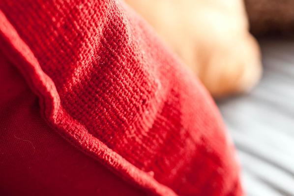 colorful sofa cushions in short stay vacation rental 