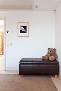 leather bench and teddy in London short term holiday apartment rental