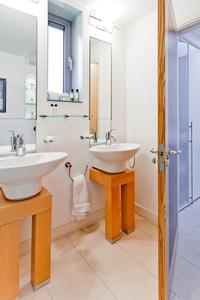 twin white sinks in short stay London serviced apartment
