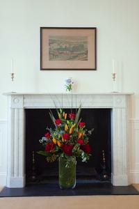 flowers and fireplace in london short term apartment